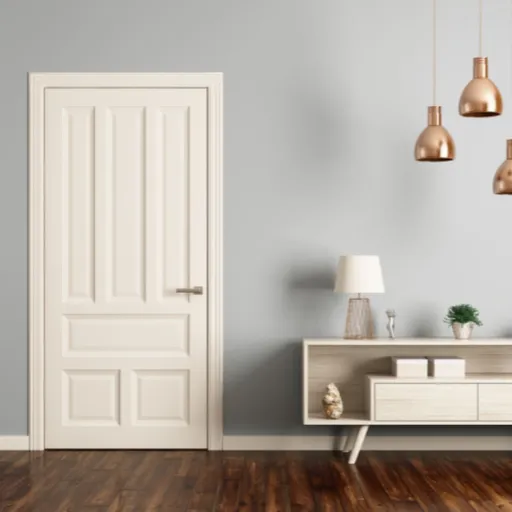 Modernes, minimalistisches Zimmer mit weißer Schiebetür, Konsolentisch und Pendelleuchten aus Kupfer.